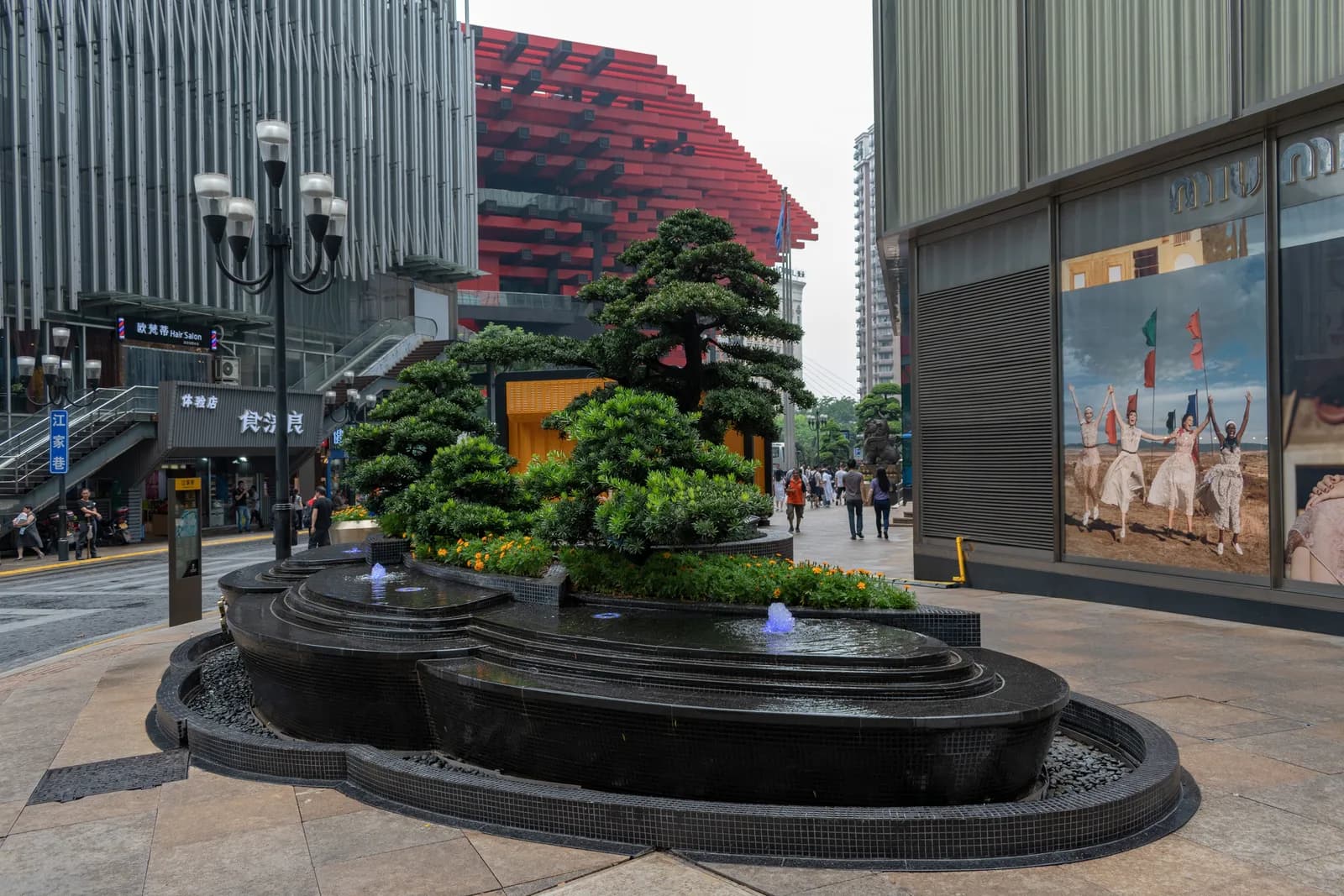 Pedestrian shopping streets and high-rise towers of the Jiefangbei district in central Chongqing