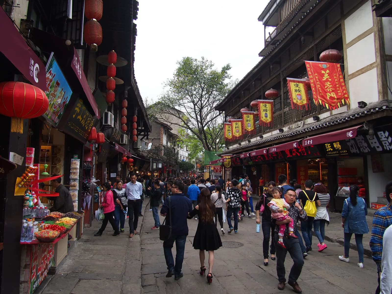Crowded lane of traditional shopfronts in Ciqikou Ancient Town, Chongqing