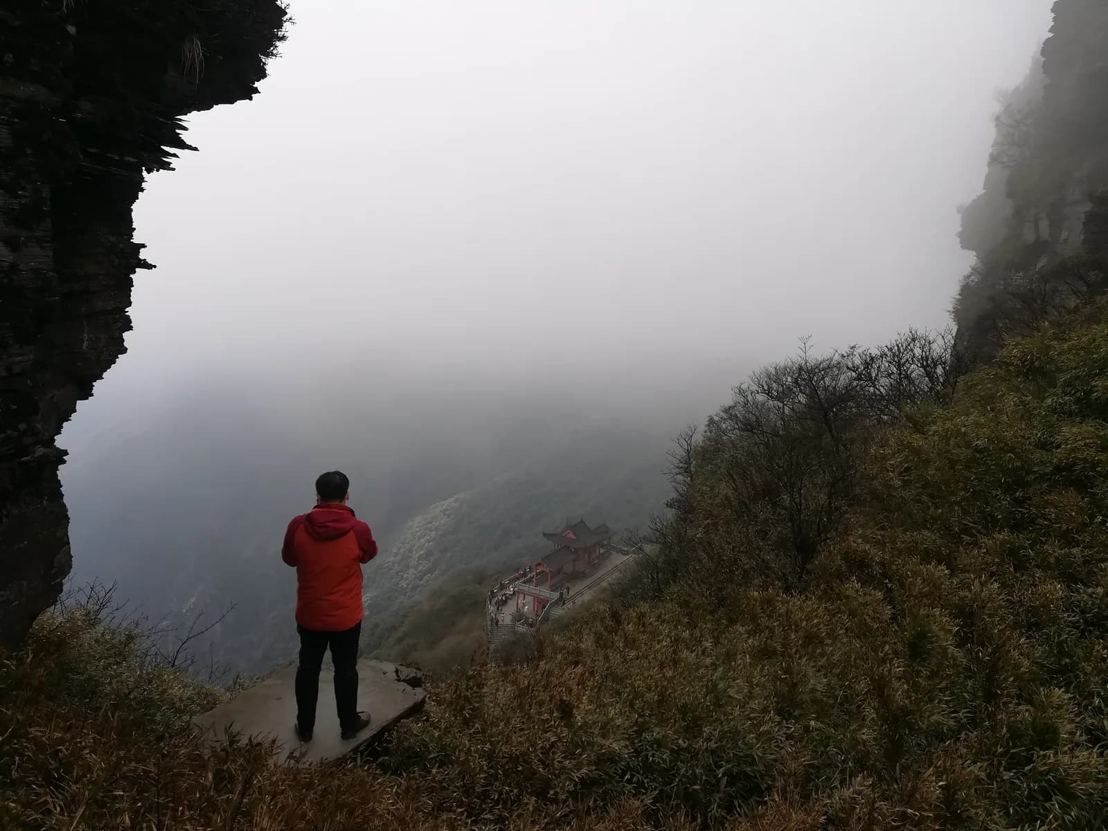 Forested gorge with a river running below Mount Fanjing in the Fanjingshan scenic area