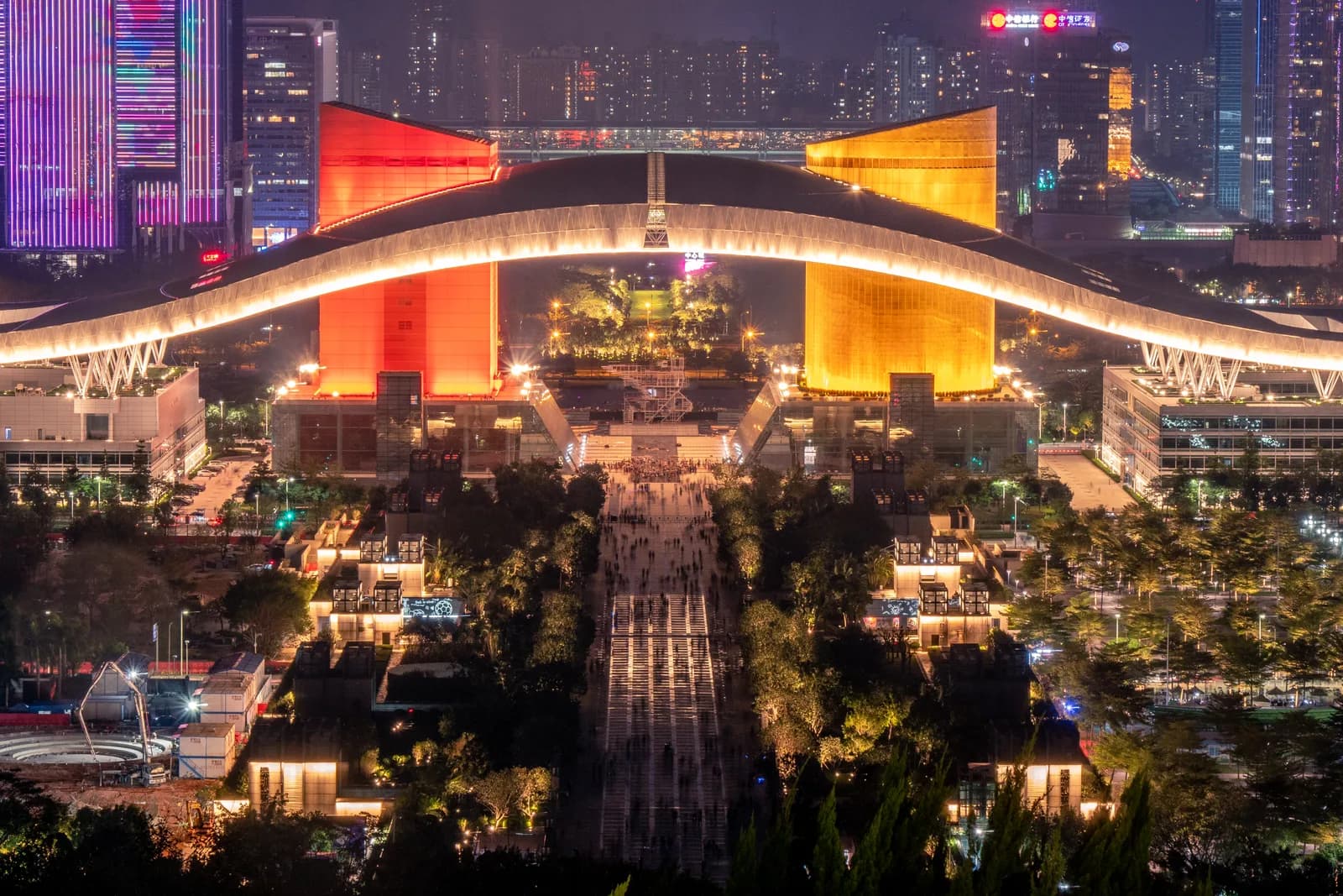 The illuminated Civic Center and Futian skyline of Shenzhen at night seen from Lianhua Mountain