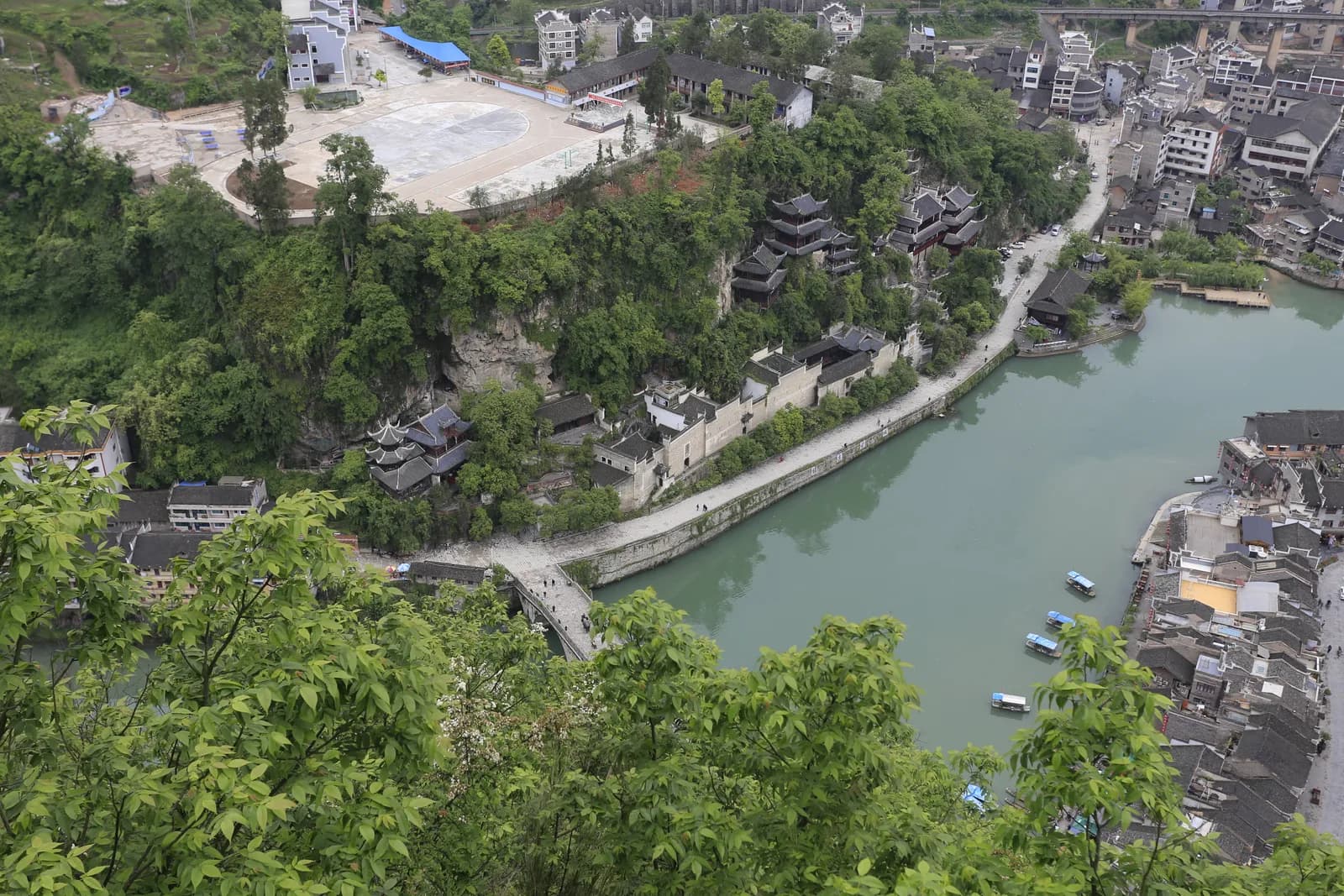 Qinglong Cave temple complex built into the cliff face above the Wuyang River in Zhenyuan, Guizhou
